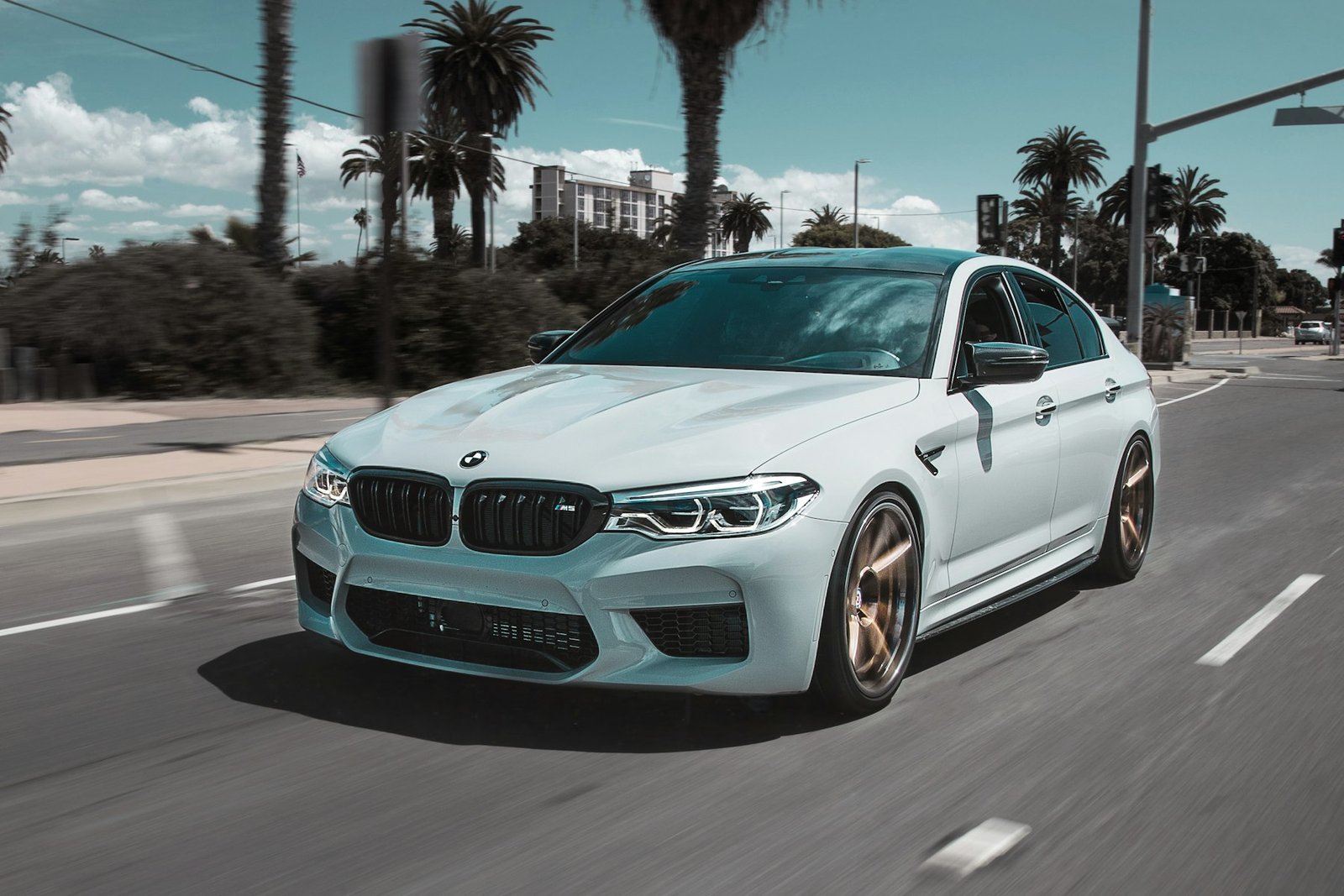 A reconditioned premium sedan on the road
